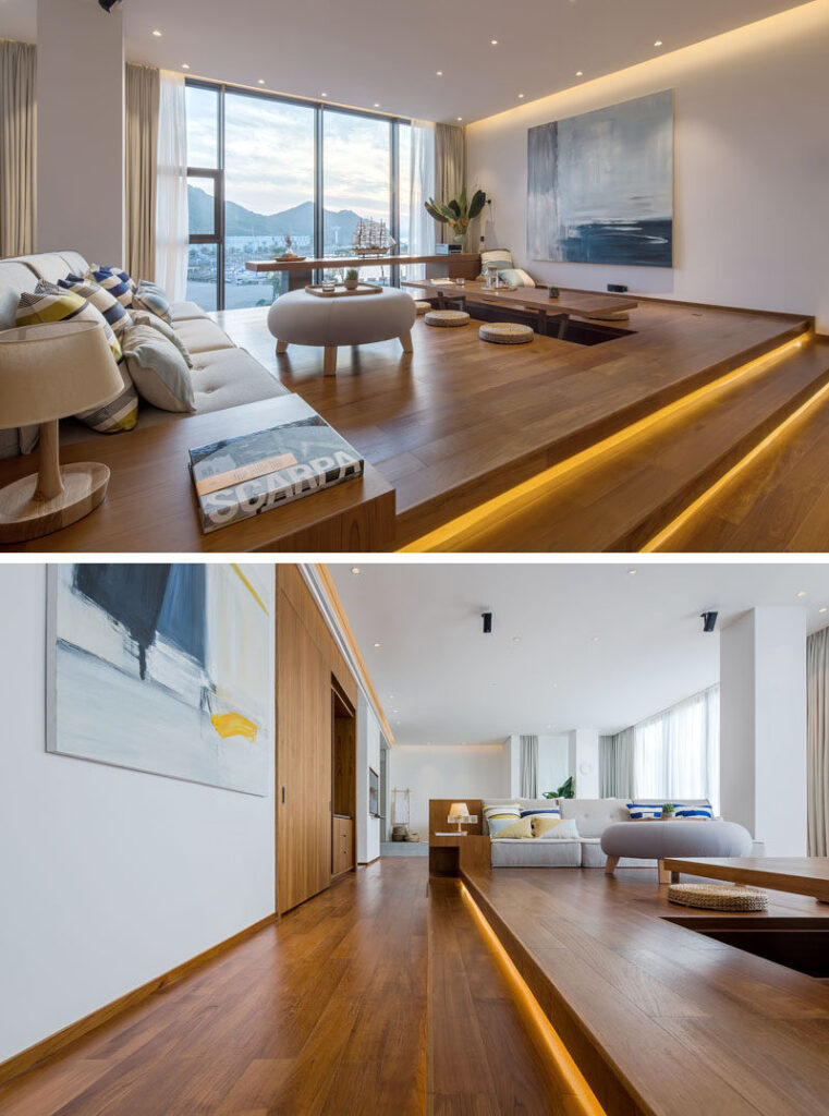 Raised Platforms Help To Make This Open Plan Apartment Feel Like It Has Different Rooms